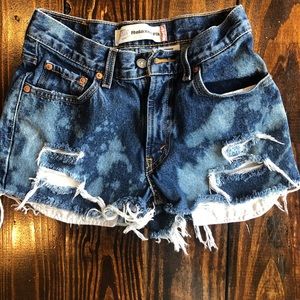 Cutoff Levi’s. Distressed and bleached. Size 14